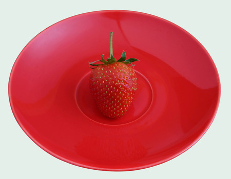 fresh strawberry placed on red plateの写真素材