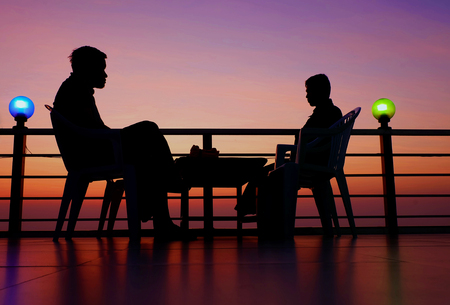 people sitting on the chair in the morning time with beautiful skyの写真素材