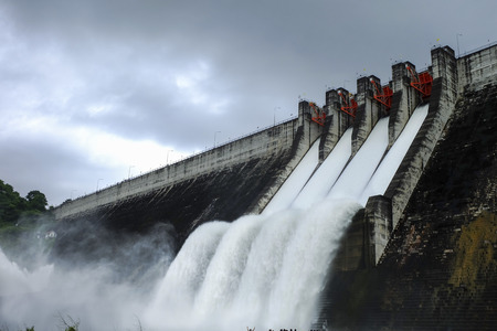 cement dam release water from spring-way