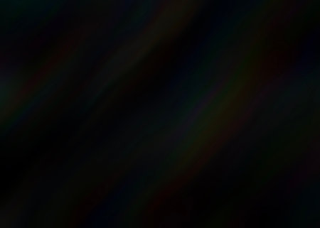 Abstract black background with some smooth lines in it and some spots on it.の写真素材