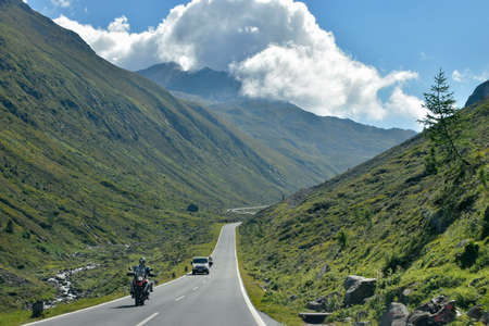 Driving in the Alps mountainsの写真素材