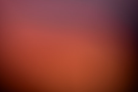 Vivid orange red gradient background useful for website, wallpaper, sunset, valentine or The Netherlandsの写真素材