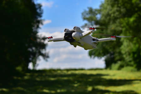 Waremme, Belgium - June 12, 2022: DJI Mini 3 Pro drone hovering