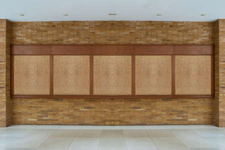 bulletin board with brick backgroundの写真素材