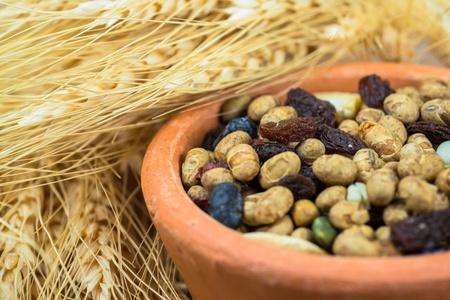 dried cereal seeds and fruits with stalks of wheat earsの写真素材