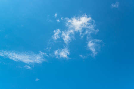 blue sky with small cloudsの写真素材