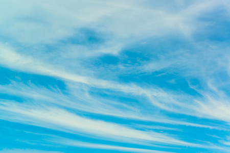 blue sky is covered by white clouds