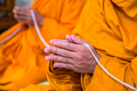 pray, Put the palms of the hands together in salute , monks, thailandの写真素材