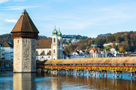 Panoramic view of wooden Chapel bridge and old town of Lucerne, Switzerland のeditorial素材
