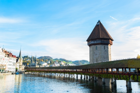 Panoramic view of wooden Chapel bridge and old town of Lucerne, Switzerland のeditorial素材