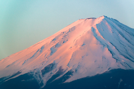 Mt  Fuji rises above Lake Kawaguchi の写真素材