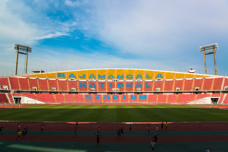 stadium, red seats on stadium steps bleacherのeditorial素材