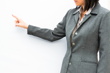 Businessman standing posture hand touchの写真素材