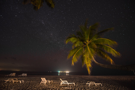 Night Scene beautiful sea and clouds illuminated by the starsの写真素材