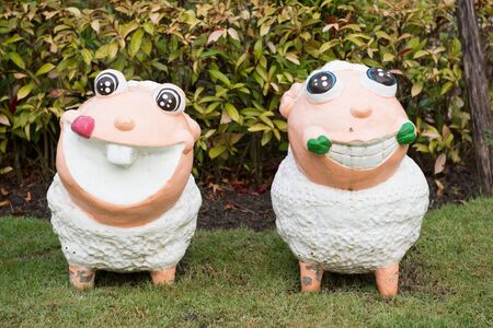 smile baked clay dolls in the gardenの写真素材