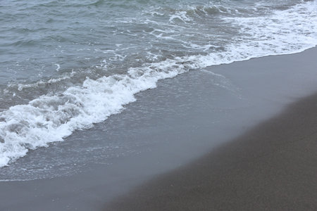 Calm waves of the peaceful Jeju Island seaの写真素材