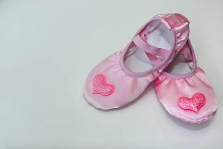 Children's ballet shoes taking a break during practiceの写真素材