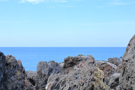 A work of art created by nature and time at Aljakji Beach in Jeju Island.の写真素材
