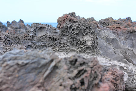 A work of art created by nature and time at Aljakji Beach in Jeju Island.の写真素材