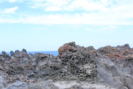 A work of art created by nature and time at Aljakji Beach in Jeju Island.の写真素材