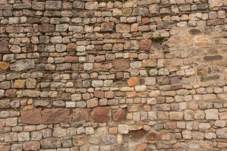 Stone wall made out of single bricks