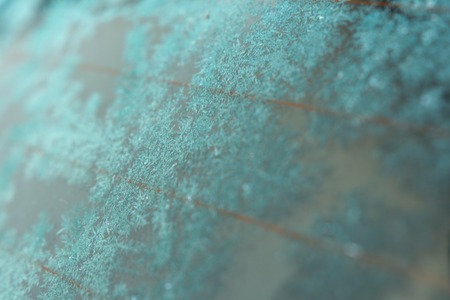 Frozen rear car window with ice crystalsの写真素材