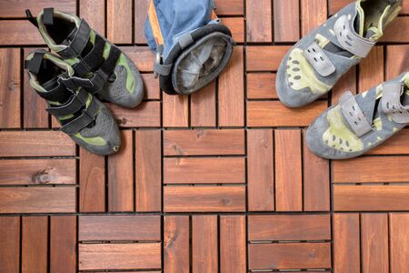 All bouldering gear you need on wooden floorの写真素材