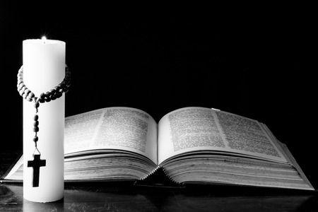 Bible, candle and the mystery of deathの写真素材