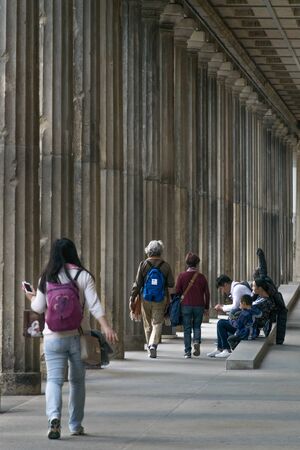 BERLIN, GERMANY - SEPTEMBER 26, 2018: Tourist walking at the Museum Island, a complex of museums...