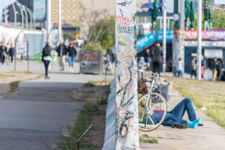 BERLIN, GERMANY - September 26, 2018: Sagacious perspective of a Wall division near the Banks of the Spree River and the Berlin Wall, a famous symbol of the separation of Germany during the Cold Warのeditorial素材