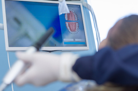 Great concept of dental procedure, young blond Brazilian woman in the dental chair suffering dental...