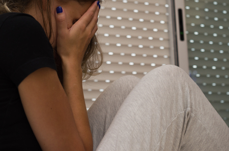 Great concept of depression, sad woman in bed.の写真素材