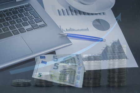 Pen, graphs, calculator, pen, credit card and euro money, finance concept, home economics.の写真素材