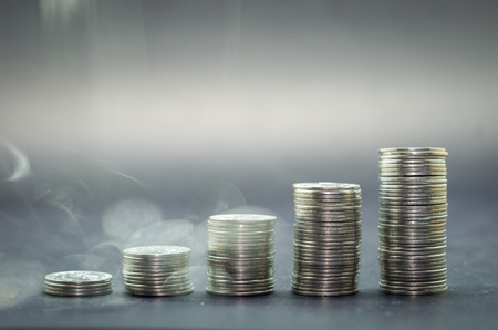Great concept of inflation, economy, savings. Stack of coins.の写真素材