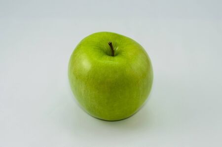 Green apple on white backgroundの写真素材