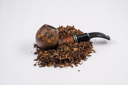 Wooden pipe on white background, chopped smoke, pipe smoking, smoking.の写真素材