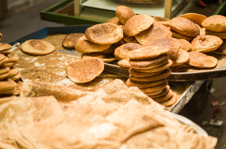 Lebanese man preparing typical sesame and cheese bread, center of Tripoli, northern Lebanon city....