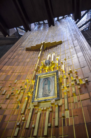 MEXICO CITY, MEXICO - June 19, 2013: Mysterious and miraculous image of Our Lady of Guadalupe, printed in Tilma, in the mantle of Juan Diego. Image exposed behind the altar of the Basilica.のeditorial素材