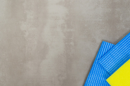 Great concept of cleaning, various products used in cleaning on gray background.の写真素材