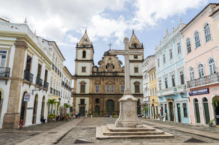 Salvador, Brazil  - Novemberl 11, 2019: Bright sunny view of the historic tourist center of Pelourinho, Salvador da Bahia, Brazil featuring colorful colonial architecture on a broad cobblestone hillのeditorial素材