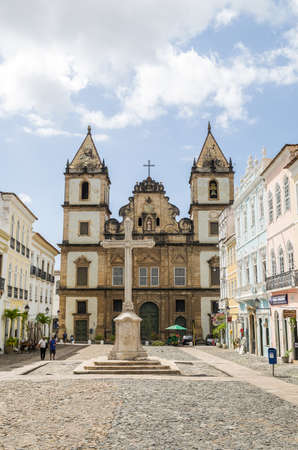 Salvador, Brazil  - Novemberl 11, 2019: Bright sunny view of the historic tourist center of Pelourinho, Salvador da Bahia, Brazil featuring colorful colonial architecture on a broad cobblestone hillのeditorial素材