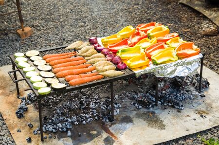 Meat and vegetable exhibition on a barbecue known as Parrilla. Typical barbecue from the south of...