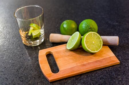 Caipirinha, traditional Brazilian alcoholic drink, typical drink made with sugar, lemon, distilled cane (cachaca) and ice.の写真素材