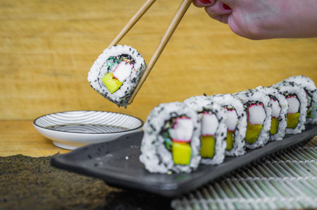 California roll on beautiful decorated plateの写真素材