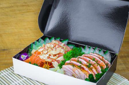 Sushi set (combo). Traditional Japanese cuisine, premium sashimi decorated in elegant surroundings.の写真素材