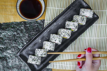 California roll on beautiful decorated plateの写真素材