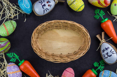 Colorful Easter eggs and other objects on a trendy black background for various Easter themed...