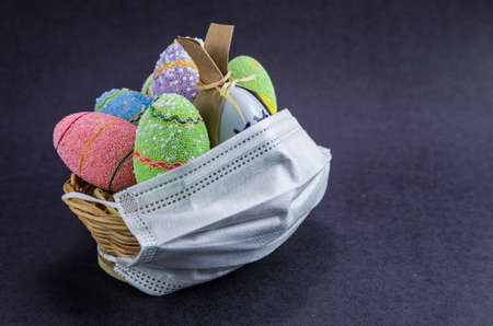 Easter basket with face mask for virus protection.の写真素材