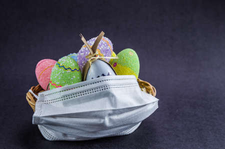Easter basket with face mask for virus protection.