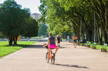 Porto Alegre, Rio Grande do Sul, Brazil, March 29 - 2021: People enjoying a sunny afternoon during a coronavirus pandemic season.のeditorial素材